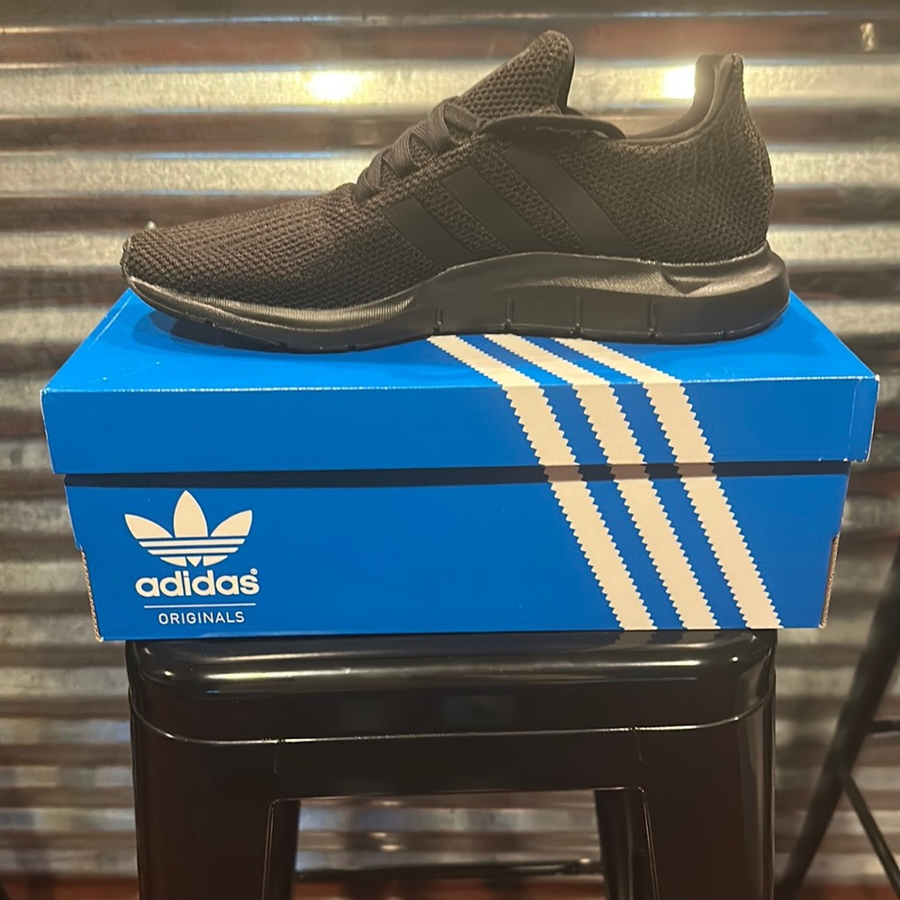Adidas all black men’s size 10 Swift run athletic shoes.